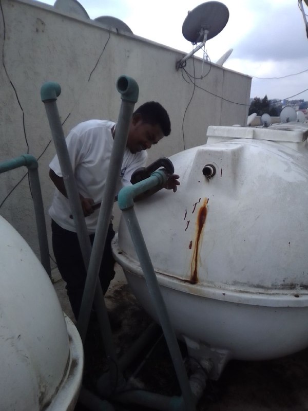 Water tank leak repair on a rooftop job